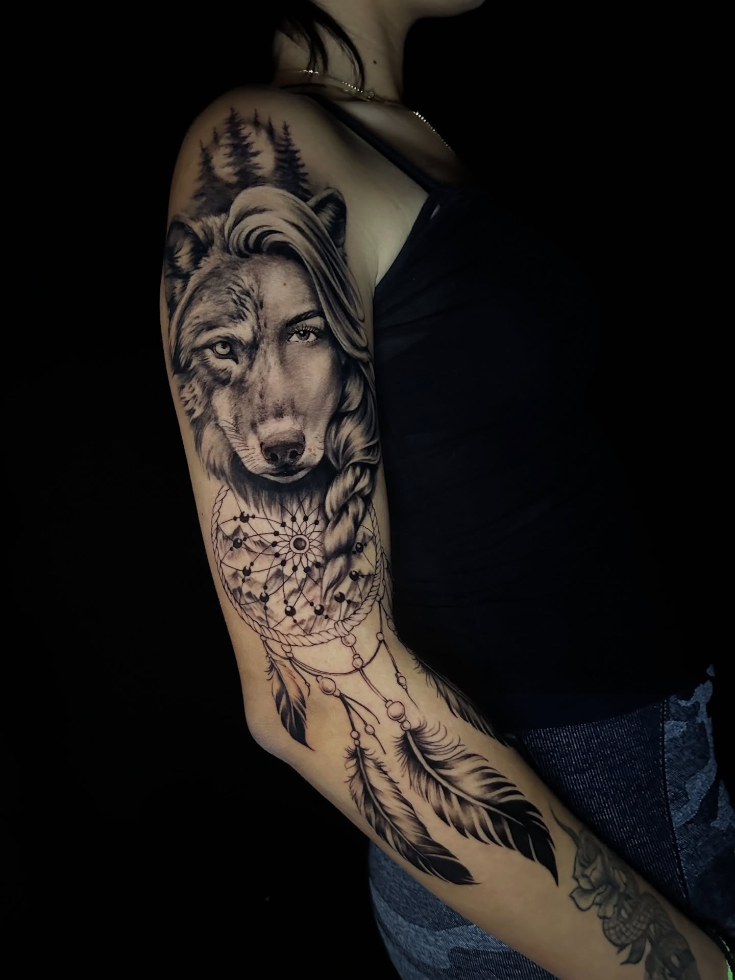 Wolf and woman portrait tattoo